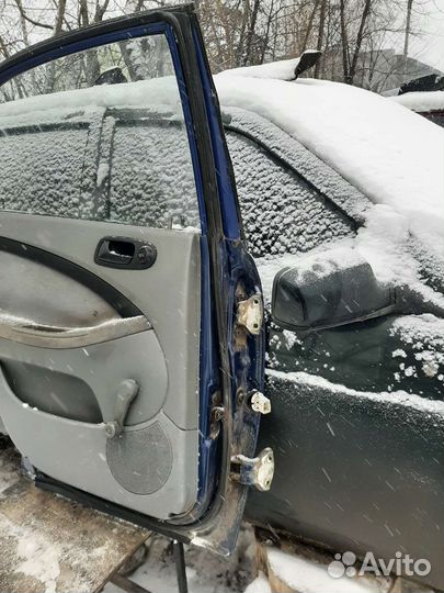 Дверь левая Шевроле Лачети