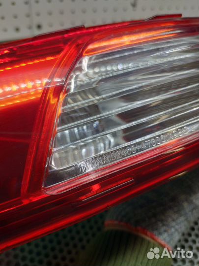 Фонарь задний Kia Sportage III 924054T300 левый