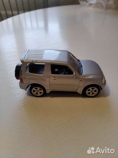 Mitsubishi pajero mini модель авто 1:64