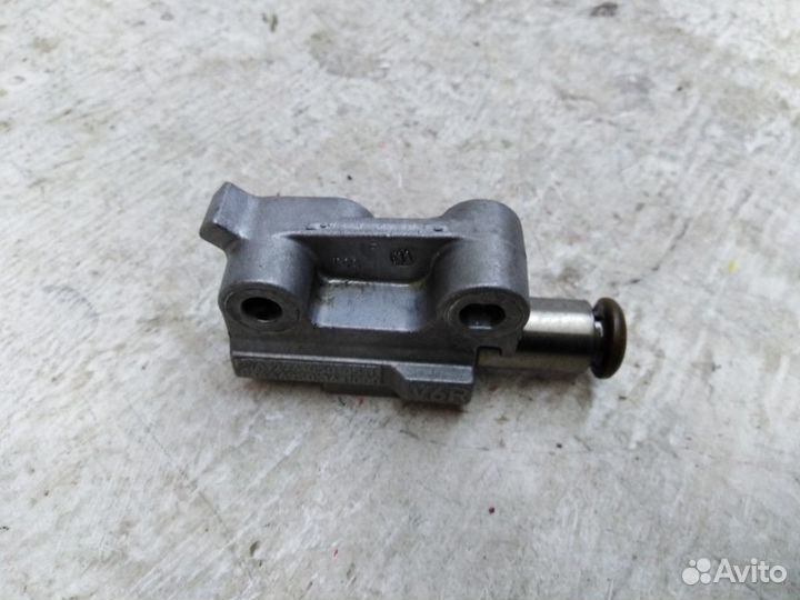 Натяжитель цепи грм