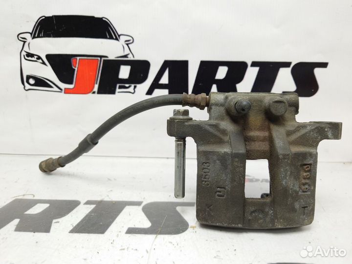 Суппорт тормозной задний Mitsubishi Outlander II