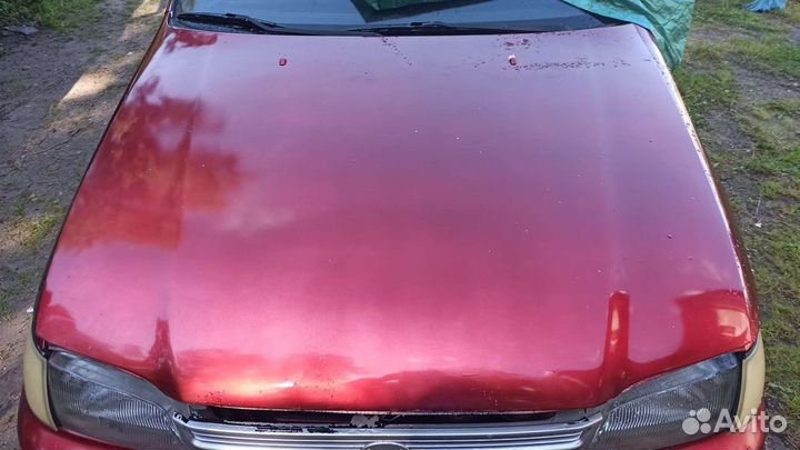 Toyota carina e капот