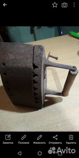 Старинный утюг на углях