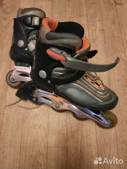 Роликовые коньки