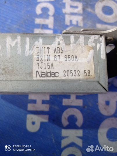 Блок управления abs Mazda Familia седан Z5-DE 1998