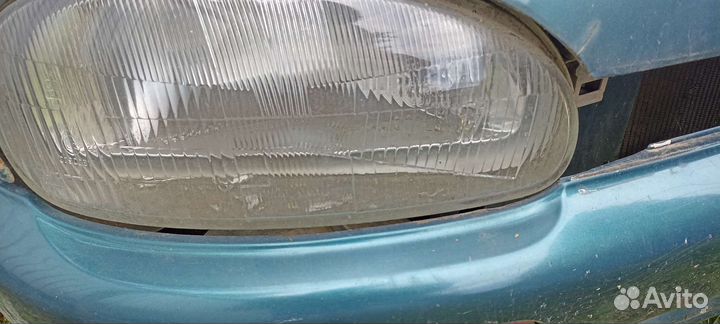 Фара на mazda 121