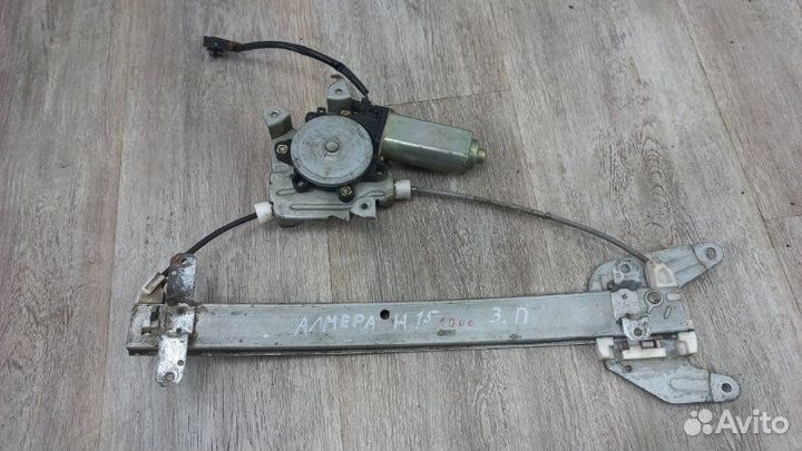 Стеклоподъемник задний правый Nissan Almera N15