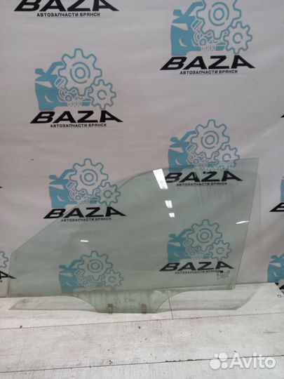 Стекло передней левой двери Kia Spectra