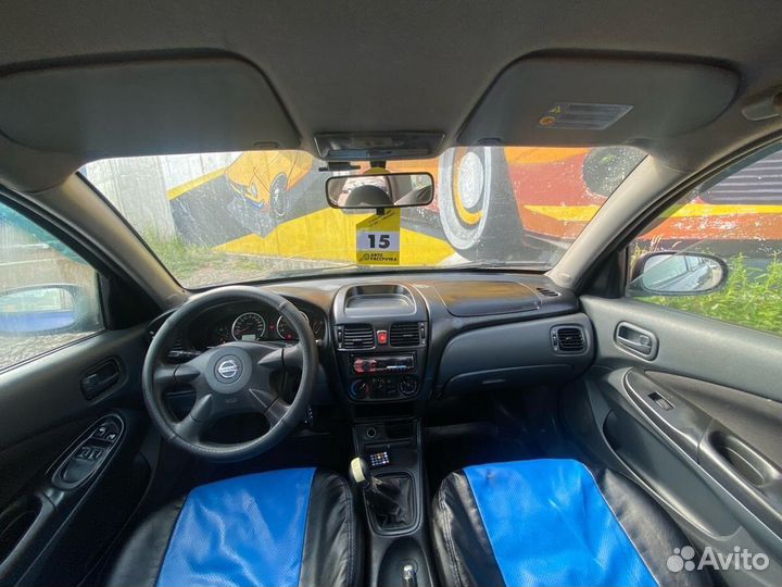 Nissan Almera, 2004