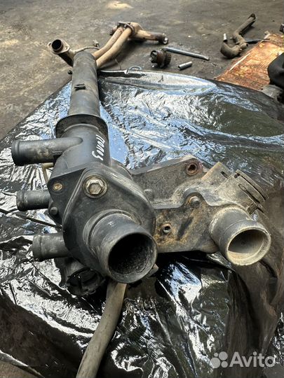 Корпус термостата VW polo3, golf3, caddy2 -1,4