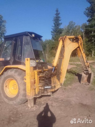 Экскаватор-погрузчик CAT 428B, 1995