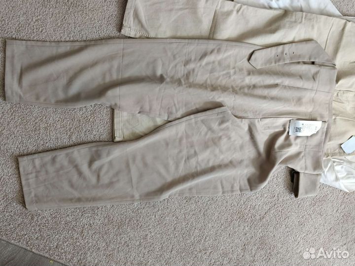 Пакетом новые вещи на 46 р