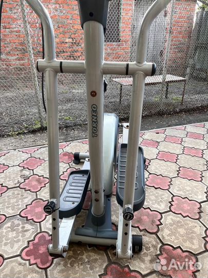 Эллиптический тренажер torneo