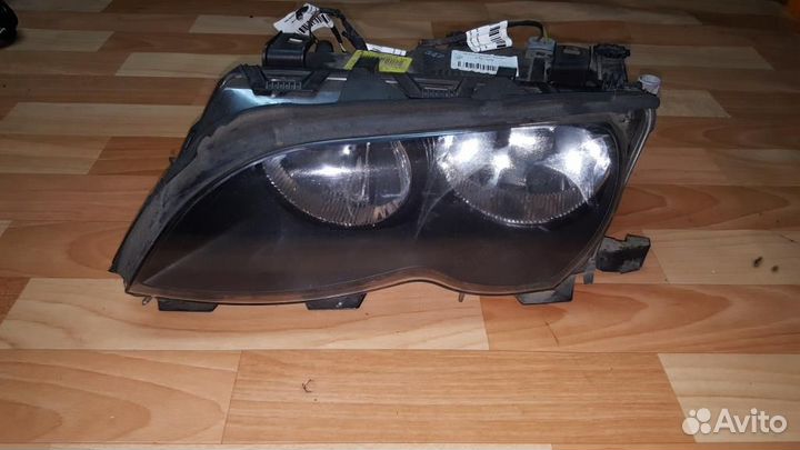 Фара левая BMW E46