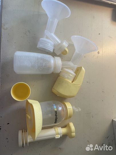 Молокоотсос medela электрический