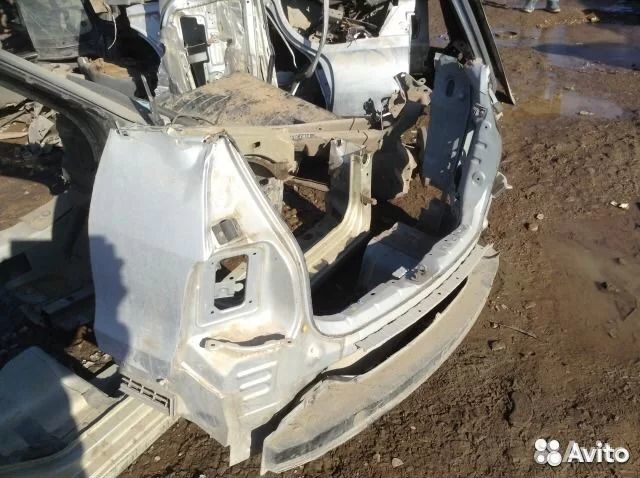 Усилитель заднего бампера kia carens 1