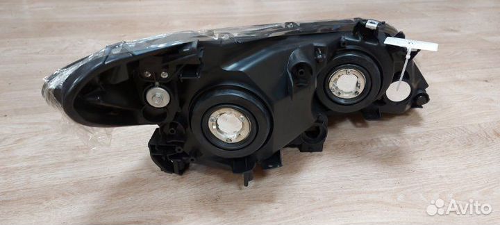 Фара галоген левая Honda Civic 8 FD1 4D 2006-2008