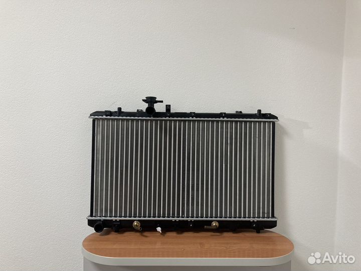 Радиатор охлаждения Сузуки SX4 06