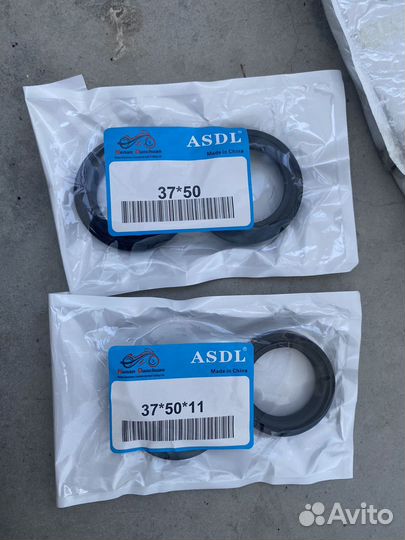 Сальники + пыльники на вилку