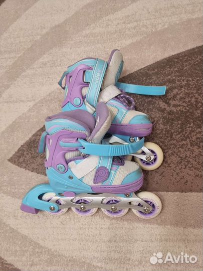 Роликовые коньки