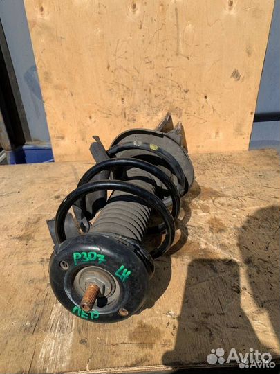 Стойка амортизатор передняя левая Peugeot 307