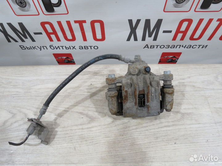 Суппорт тормозной задний правый Kia Optima 4