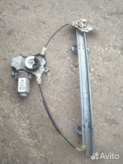 Nissan Almera N16. стеклоподъёмник передний правый