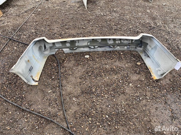 Бампер задний Nissan Primera 1993г