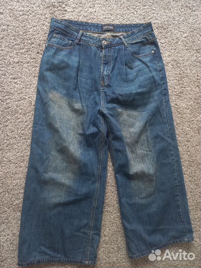 Джинсы широкие