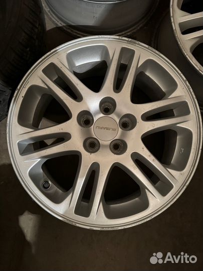 Продам оригинальные литые диски Subaru R16