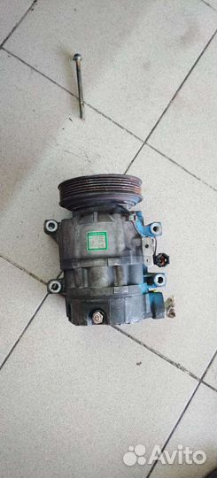 Компрессор кондиционера nissan