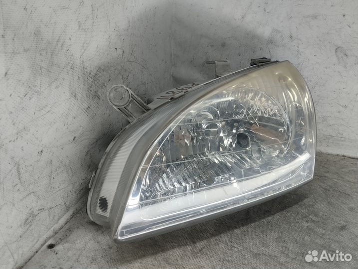 Фара левая KIA Carens 1999-2002 год, оригинал