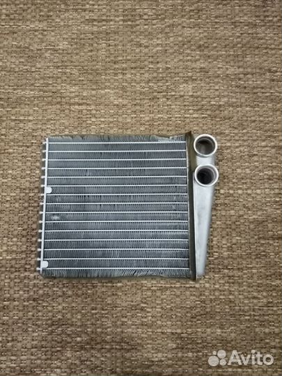 Радиатор печки Nissan march