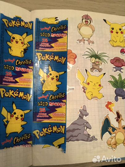 Продам колекцию наклек покемон две тетради