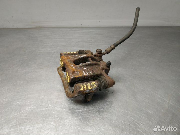 Суппорт задний левый Toyota Corolla 9 E120 4zzfe