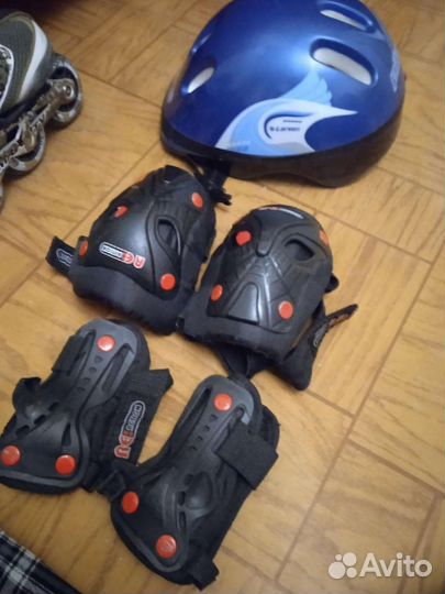 Роликовые коньки