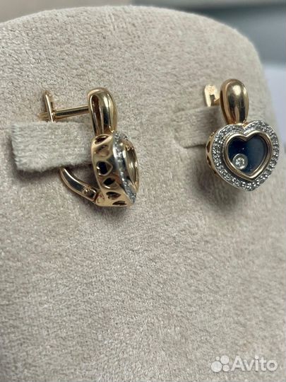 Золотые серьги с подвижным бриллиантом