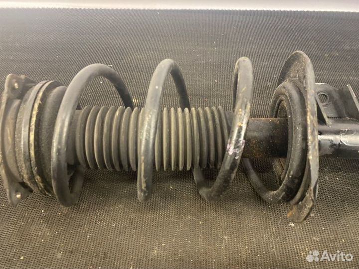 Амортизатор передний левый Nissan X-Trail T31