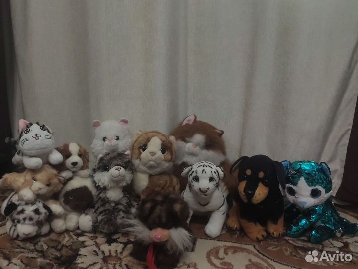 Мягкие игрушки кошки