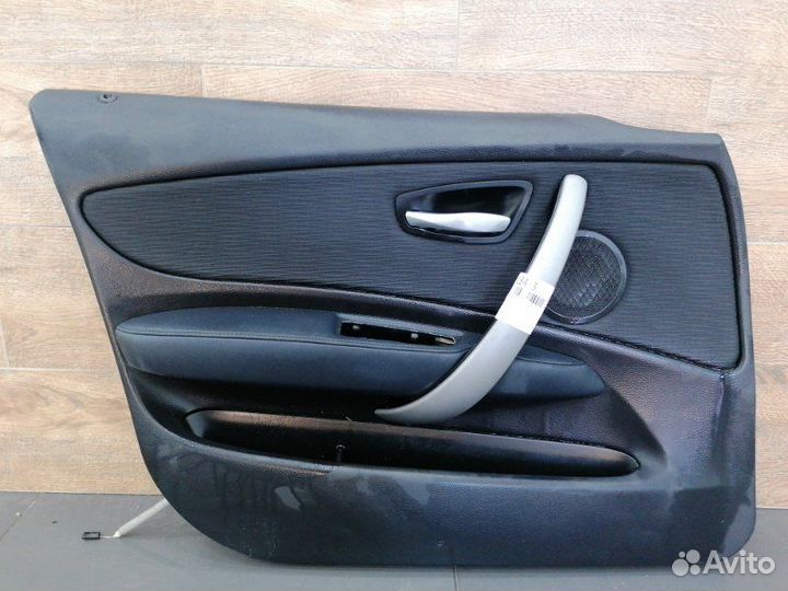 Обшивка двери лев. перед. BMW 1 Series
