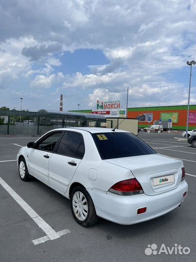 Mitsubishi Lancer 1.3 МТ, 2007, 167 000 км