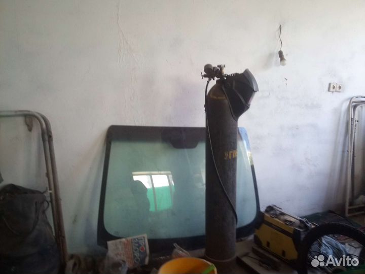 Лобовое стекло кия цирато 2013г