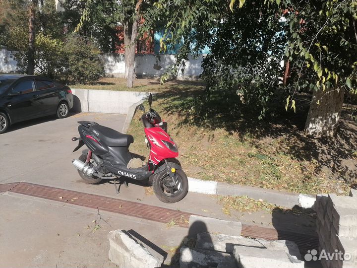 Скутер Omaks