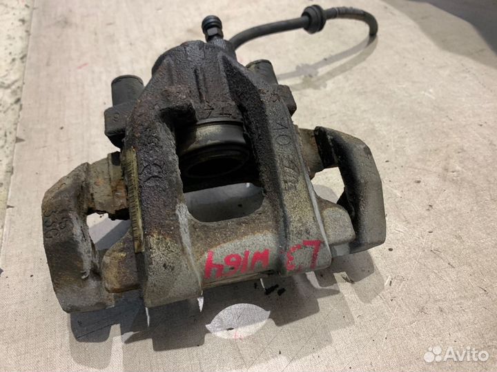 Суппорт тормозной задний левый Mercedes Ml350 W164