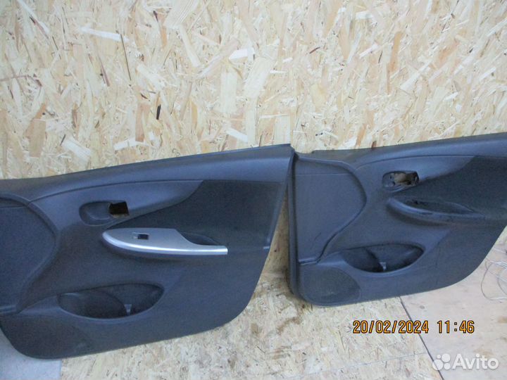 Обшивка двери Тойота Королла 150