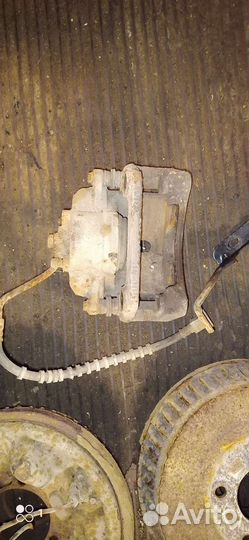 Суппорт тормозной на Караван Вояджер