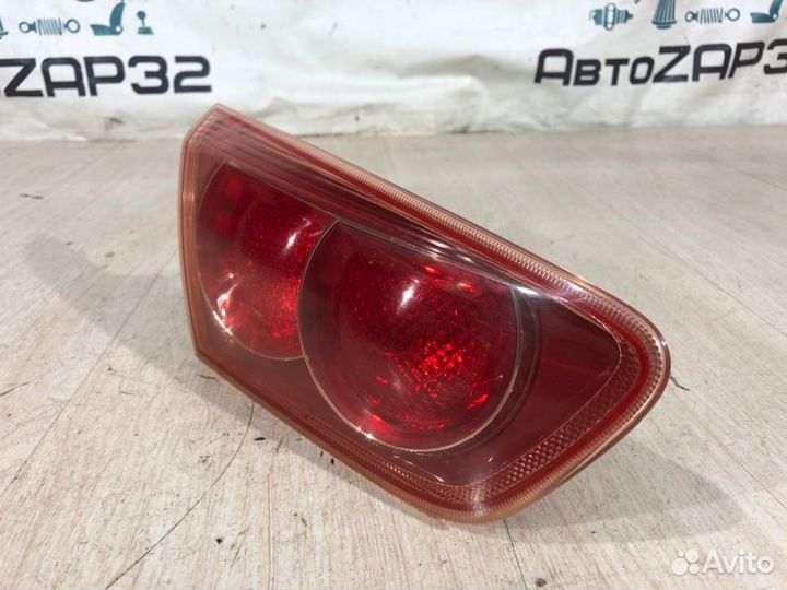 Фонарь крышки багажника левый Mitsubishi Lancer 10