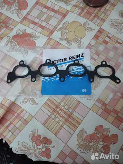 Прокладка впускного коллектора Mazda 323