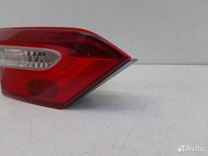 Фонарь в крышку багажника левый Toyota Camry XV70