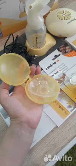 Молокоотсос medela swing